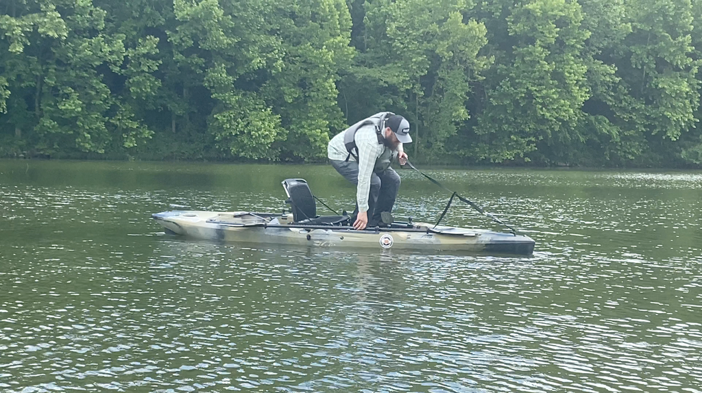 Standing Up kayak fishing with The Ally Stand Up Assist and Drag